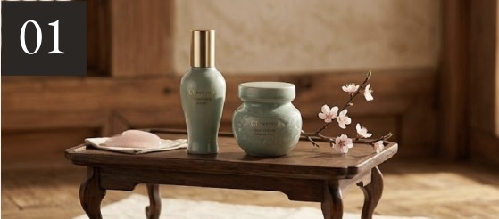 Glowryeo refillable skincare bottles on a wooden tray